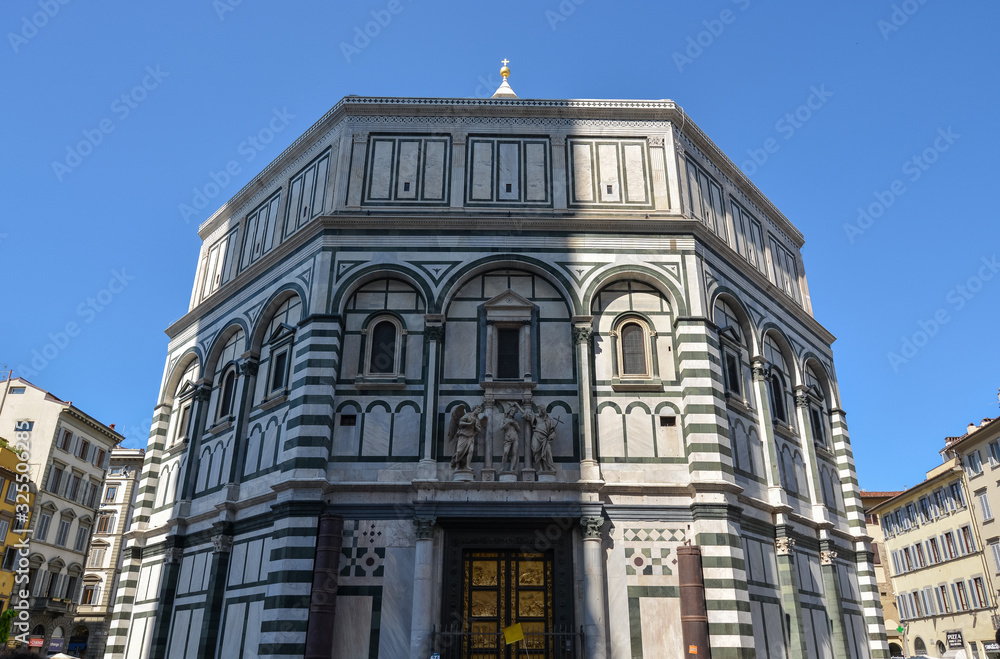 The baptistery of San Giovanni with the cathedral in Florence