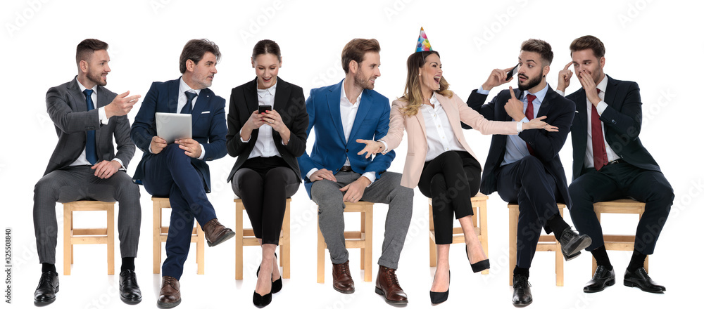 Team of 7 happy businessmen celebrating a coworker birthday Team of 7 happy businessmen celebrating a coworker birthday