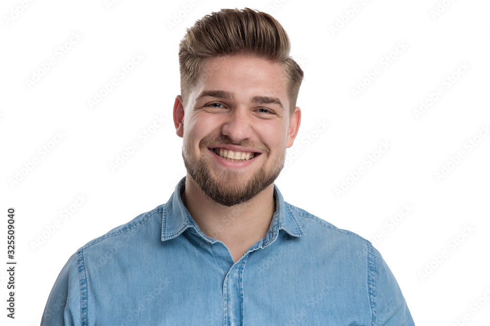 Cheerful casual man laughing and looking forward Cheerful casual man laughing and looking forward