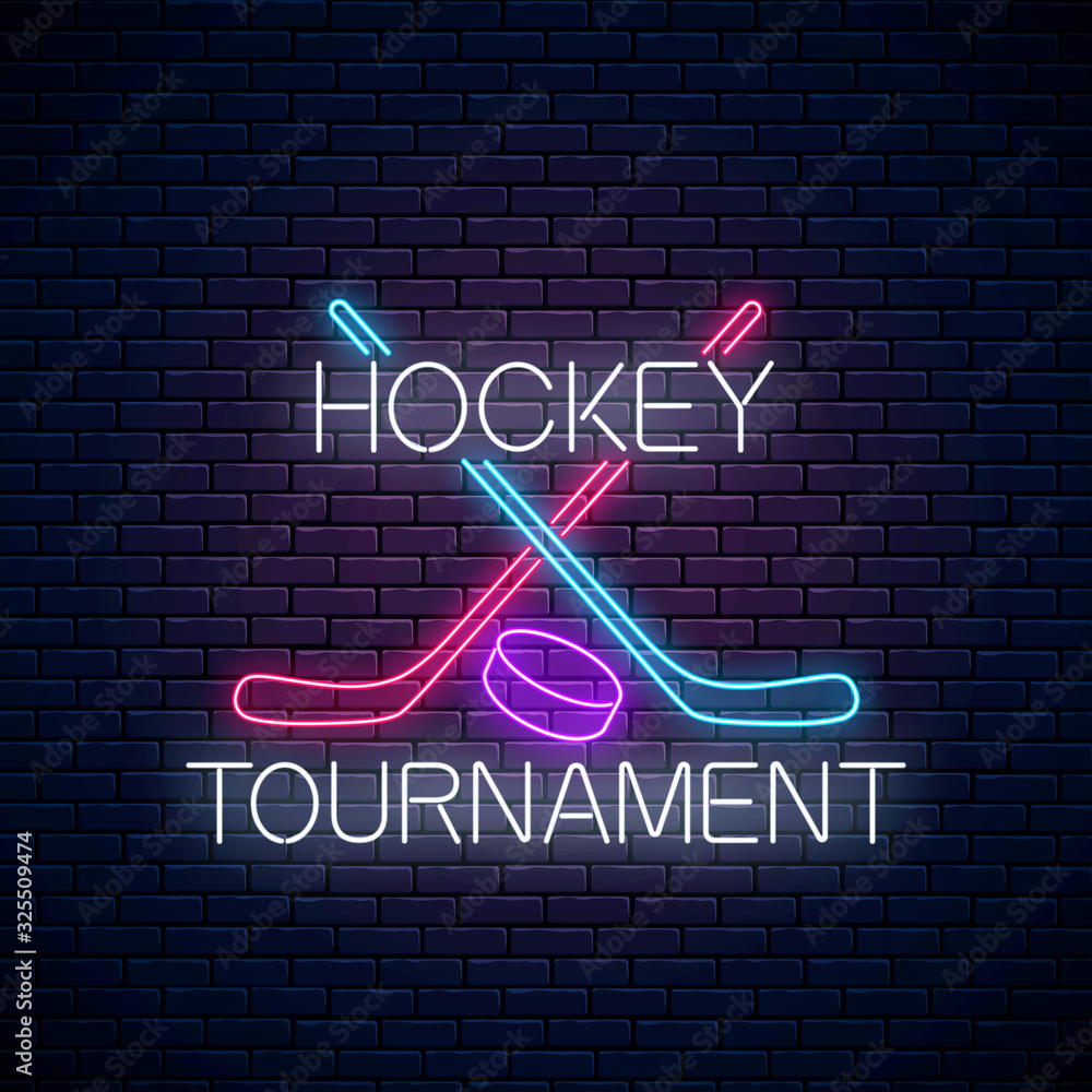 Hockey tournament neon sign with hockey sticks and puck. Ice hockey