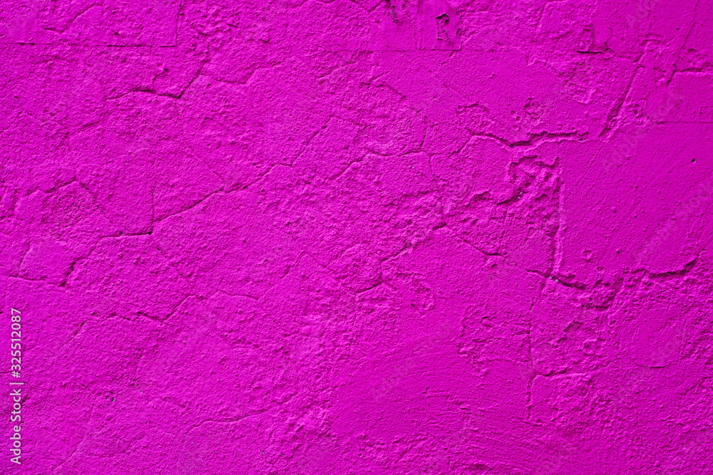 Background of a red stucco coated and painted exterior, rough cast of cement and concrete wall texture, decorative coating Background of a red stucco coated and painted exterior, rough cast of cement and concrete wall texture, decorative coating
