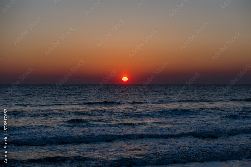 Sunrise by the beach