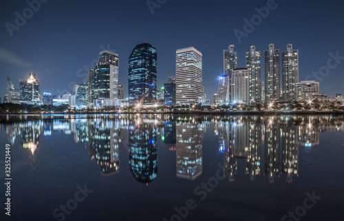 Benjakiti Park Lake Reflection of Skyscrapers at Night in Bangkok, Thailand