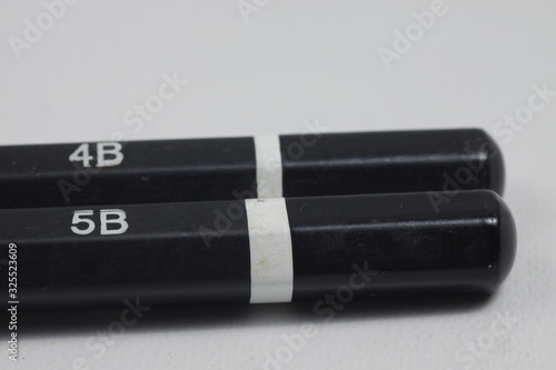 Wallpaper Mural Graphite wooden pencil on an isolated white background Torontodigital.ca