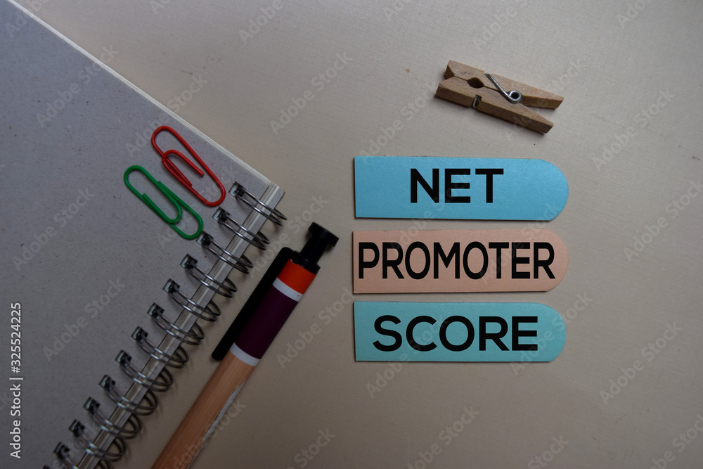 Net Promoter Score - NPS text on sticky notes isolated on office desk Net Promoter Score - NPS text on sticky notes isolated on office desk