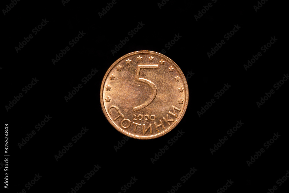 Bulgarian 5 stotinki coin from 2000, reverse showing denomination above date, half circle of 12 stars across top. Isolated on black background Bulgarian 5 stotinki coin from 2000, reverse showing denomination above date, half circle of 12 stars across top. Isolated on black background