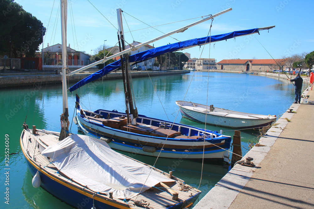 Traditional boats in the river port of Frontignan, a seaside resort in the Mediterranean sea, Herault, Occitanie, France