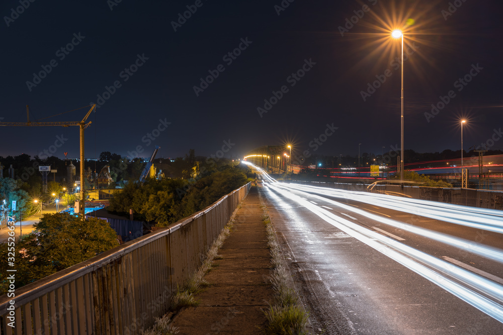 Long exposure of passing vehicles on Pancevacki bridge in Belgrade