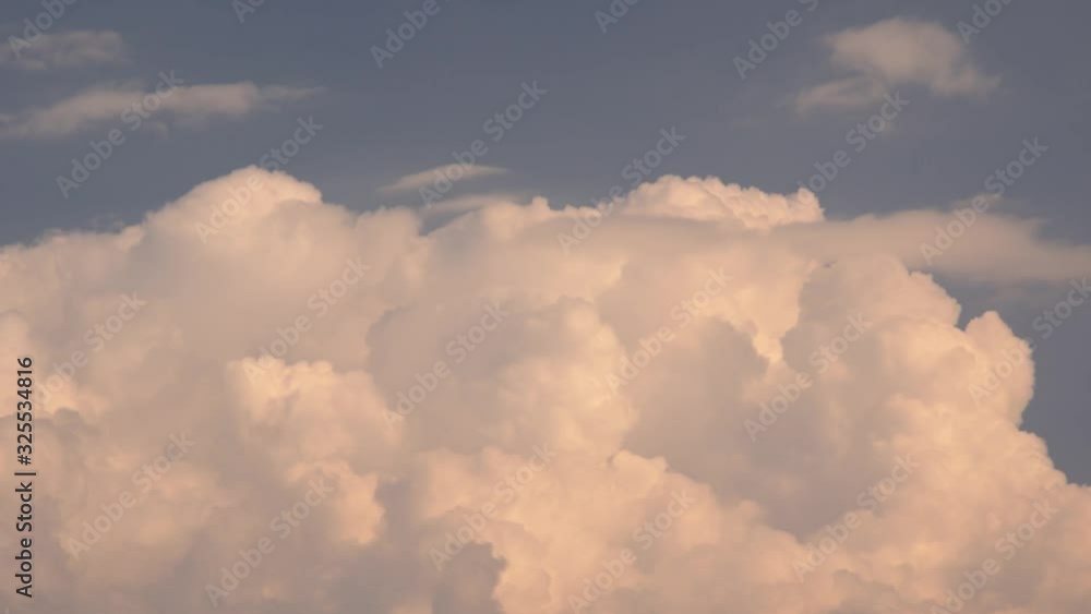 Lush clouds move quickly and change their forms in the sky Lush clouds move quickly and change their forms in the sky