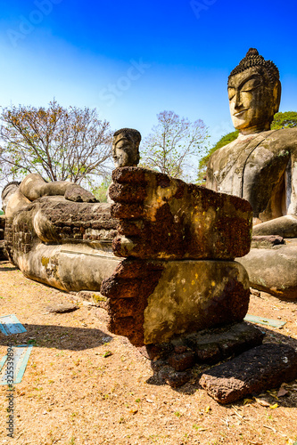 Ancient Buddha statue in Pra Khaeo Temple photo