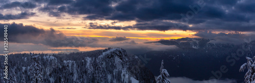 Canadian Nature Landscape covered in fresh white Snow during colorful and vibrant winter sunset. Taken in Seymour Mountain, North Vancouver, British Columbia, Canada. Panorama