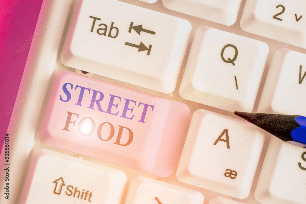 Writing note showing Street Food. Business concept for cooked food sold by vendors in a street or other public location Writing note showing Street Food. Business concept for cooked food sold by vendors in a street or other public location