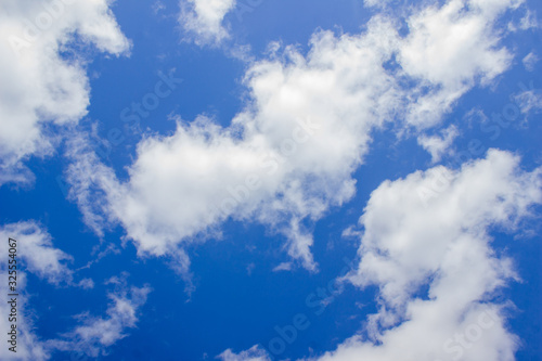 Blue sky with cirrus white clouds. Beautiful sky. Summer.