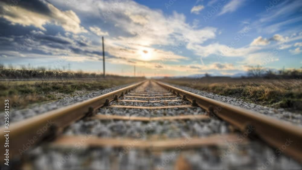 4K Forwarding low angle train rail perspective in motion - landscape travel and transport background 4K Forwarding low angle train rail perspective in motion - landscape travel and transport background