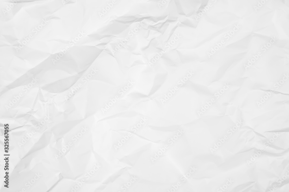 White crumpled paper texture background. Clean white paper. Top view. White crumpled paper texture background. Clean white paper. Top view.