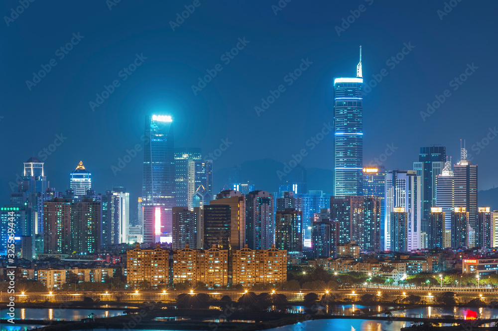 Skyline of Shenzhen city, China at night. Viewed from Hong Kong border