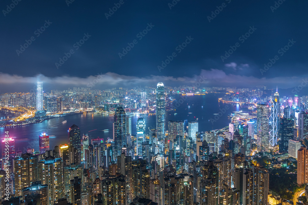 Panorama of Victoria Harbor of Hong Kong city at night