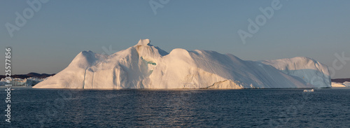 Ice glaciers in Diski Bay during the midnight sun, Ilulissat Icefjord, Greenland