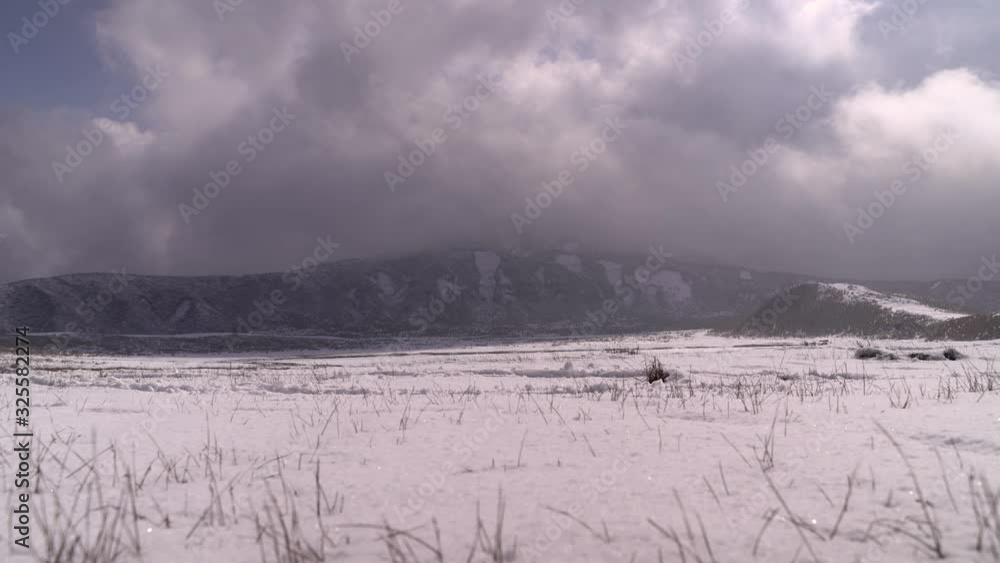 Gloomy Atmosphere And Snow Covered Landscape Of Mount Aso In Kumamoto Japan - wide shot Gloomy Atmosphere And Snow Covered Landscape Of Mount Aso In Kumamoto Japan - wide shot
