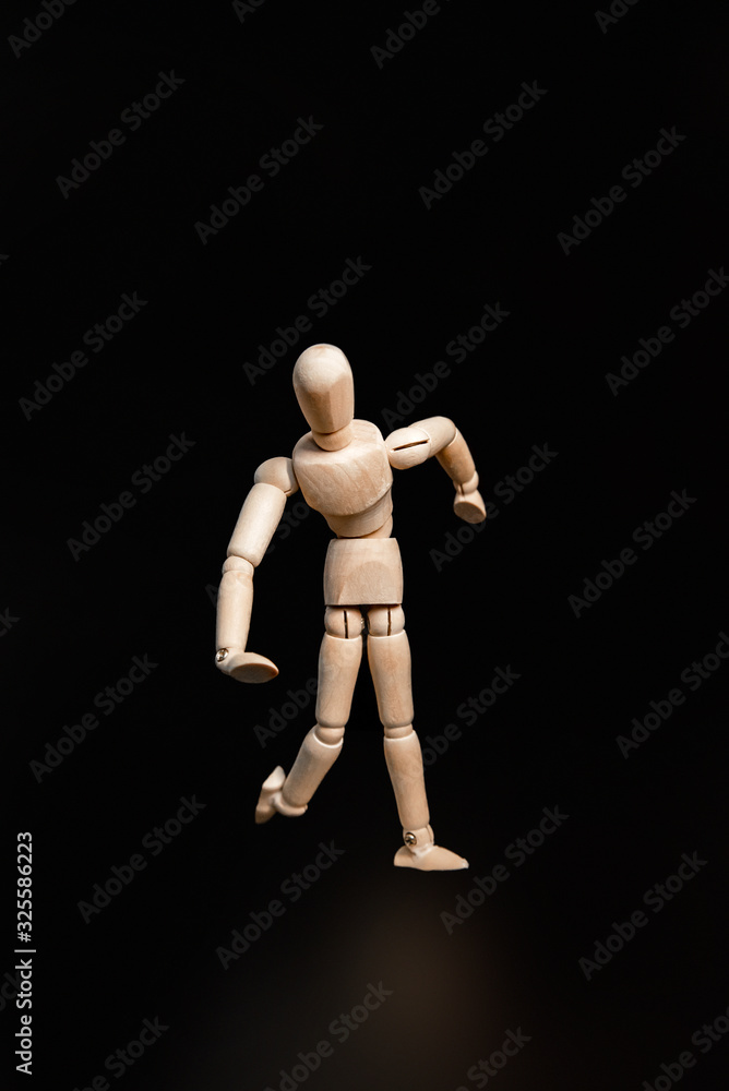 the wooden man runs strangely, stumbles, falls, hits the ball. Adding any emotion, joy, horror, sadness, fun the wooden man runs strangely, stumbles, falls, hits the ball. Adding any emotion, joy, horror, sadness, fun