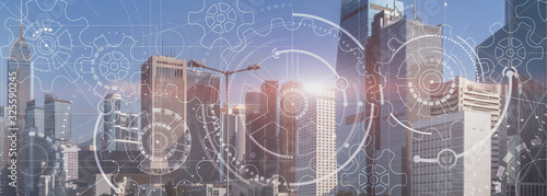 Business technology concept. Cogwheel Gears Mechanism with modern city view. Website panoramic header background.