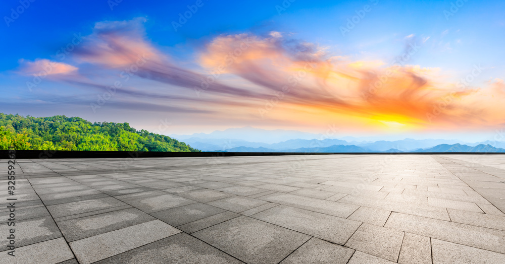 Empty floor and beautiful sky clouds with mountain at sunset.