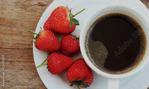 black coffee banana cake and fresh strawberry refeshing the day photo