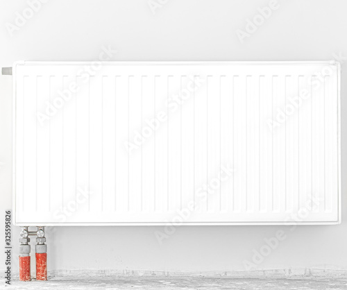 Wallpaper Mural Radiator in front of a white wall. Space for text. Torontodigital.ca