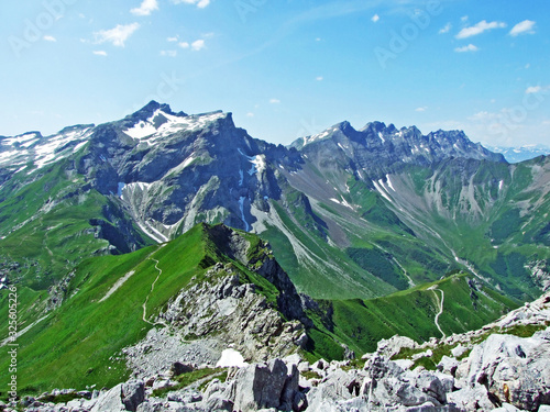 View of the Ratikon border alpine mountain massif or Rätikon Grenzmassiv (oder Raetikon) from Liechtenstein Alps - Malbun, Liechtenstein photo