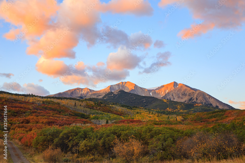 Sunrise below Mt. Sopris during the height of Autumn color in the Maroon Bells - Snowmass Wilderness in the Rocky Mountains of Colorado 