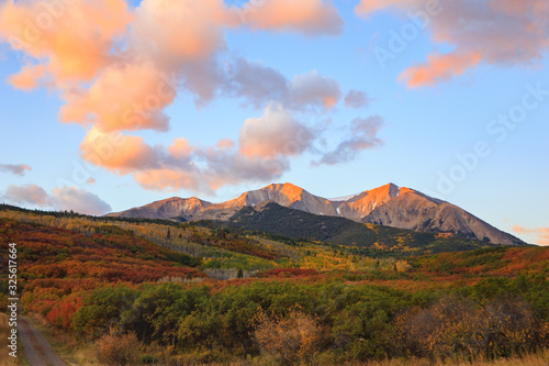 Sunrise below Mt. Sopris during the height of Autumn color in the Maroon Bells - Snowmass Wilderness in the Rocky Mountains of Colorado 