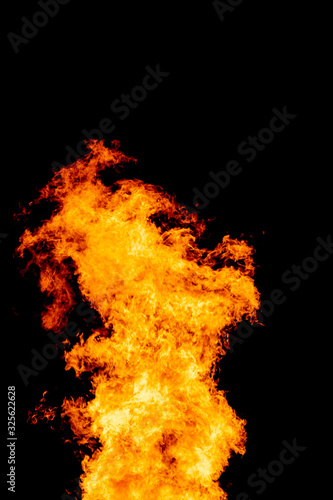 Yellow red and orange fire flames blazing fiery burning isolated on a black background