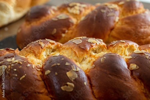 Easter greek tsoureki braid, sweet bread brioche background