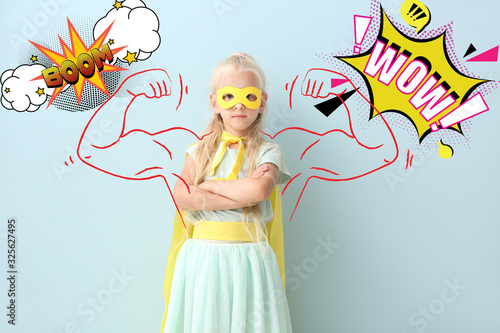 Cute little girl dressed as...