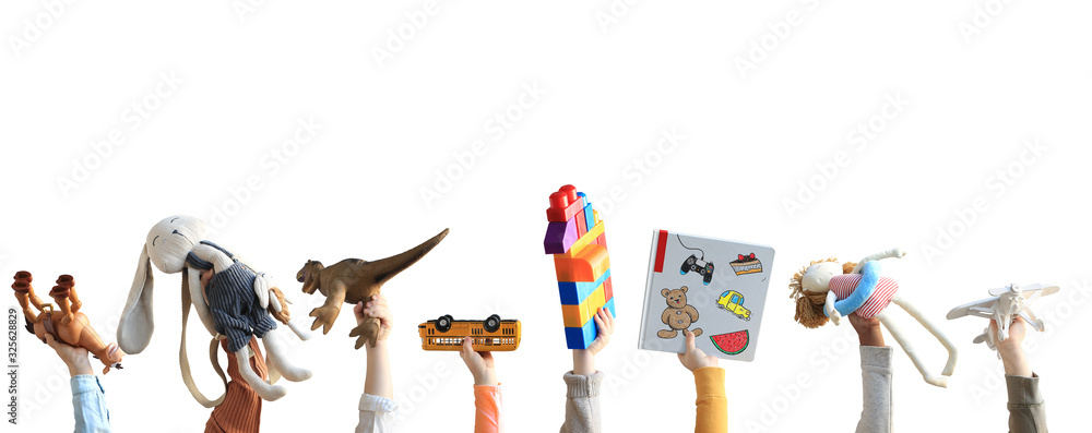 Children holding toys, concept of the childhood - obrazy, fototapety, plakaty 
