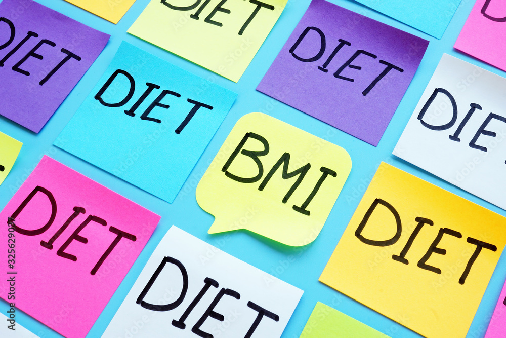BMI body mass index and word diet on the colorful sheets. BMI body mass index and word diet on the colorful sheets.