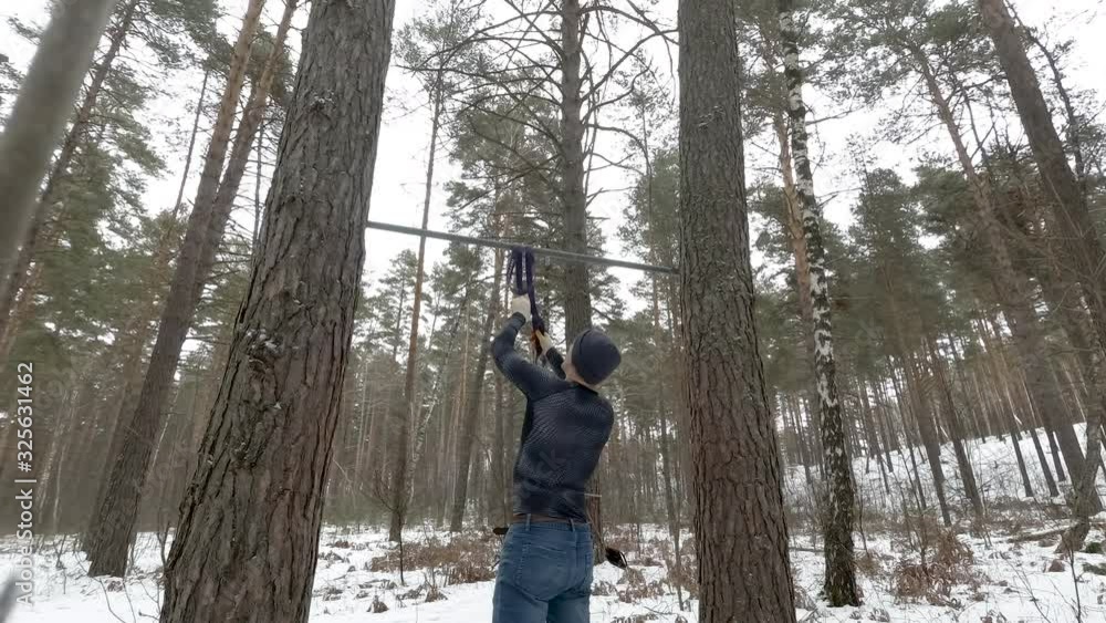 Young Athletic Man working out in forest Young Athletic Man working out in forest
