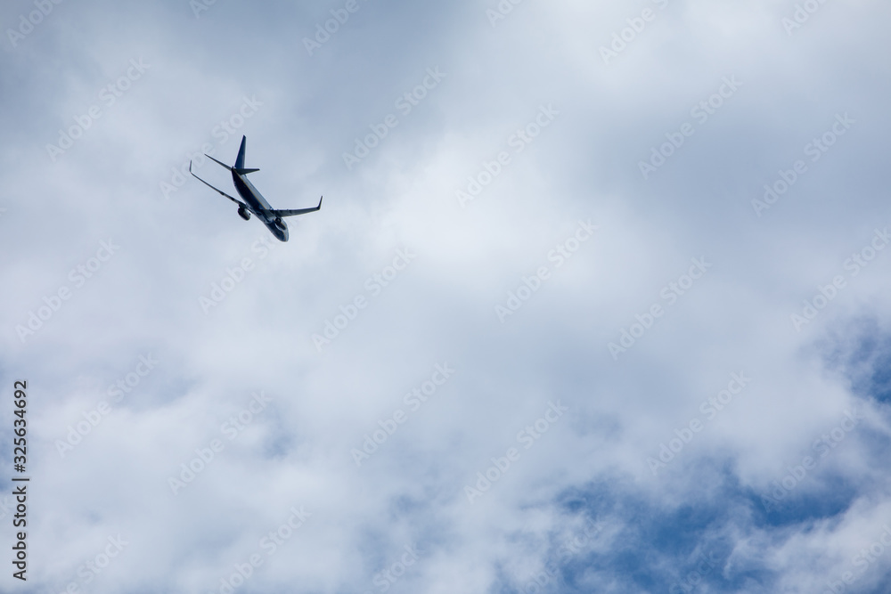 Fototapeta premium airplane in sky travel concept