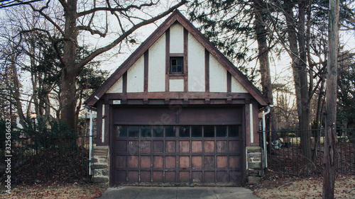 An Old White and Brown Garage © HRTNT Media