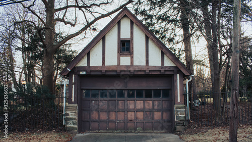 An Old White and Brown Garage photo