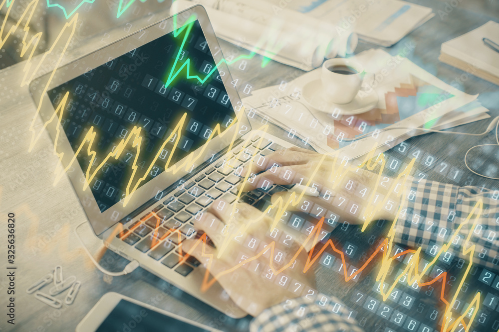 Double exposure of forex graph with man working on computer on background. Concept of market analysis.