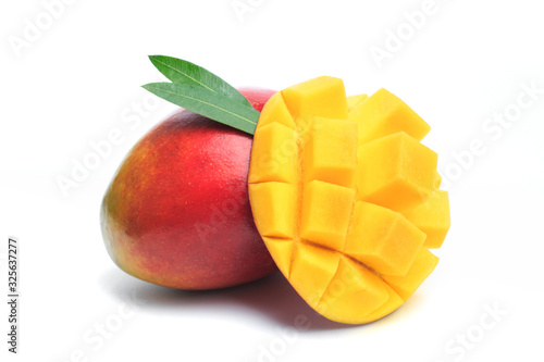 Mango fruit and mango cubes. Isolated on a white background. - Image