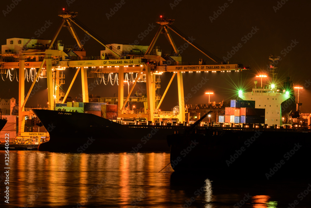 Cargo ship loading goods at shipping port at bangkok ,Thailand Cargo ship loading goods at shipping port at bangkok ,Thailand