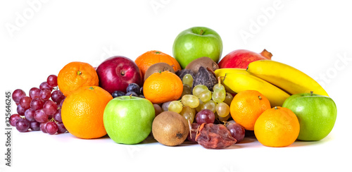 Assortment or tropical fruits isolated on white background photo