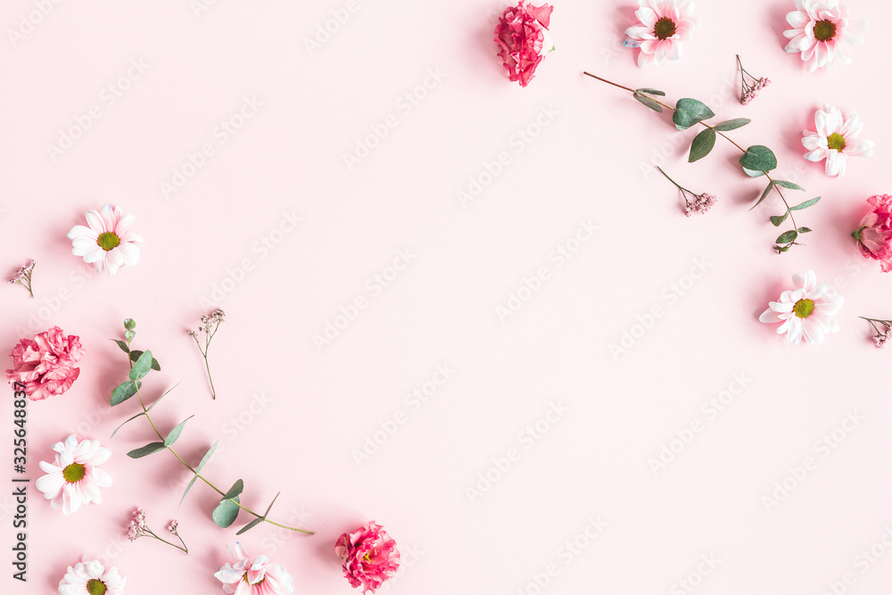 Fototapeta Flowers composition. Pink flowers and eucalyptus branches on pink background. Valentines day, mothers day, womens day concept. Flat lay, top view