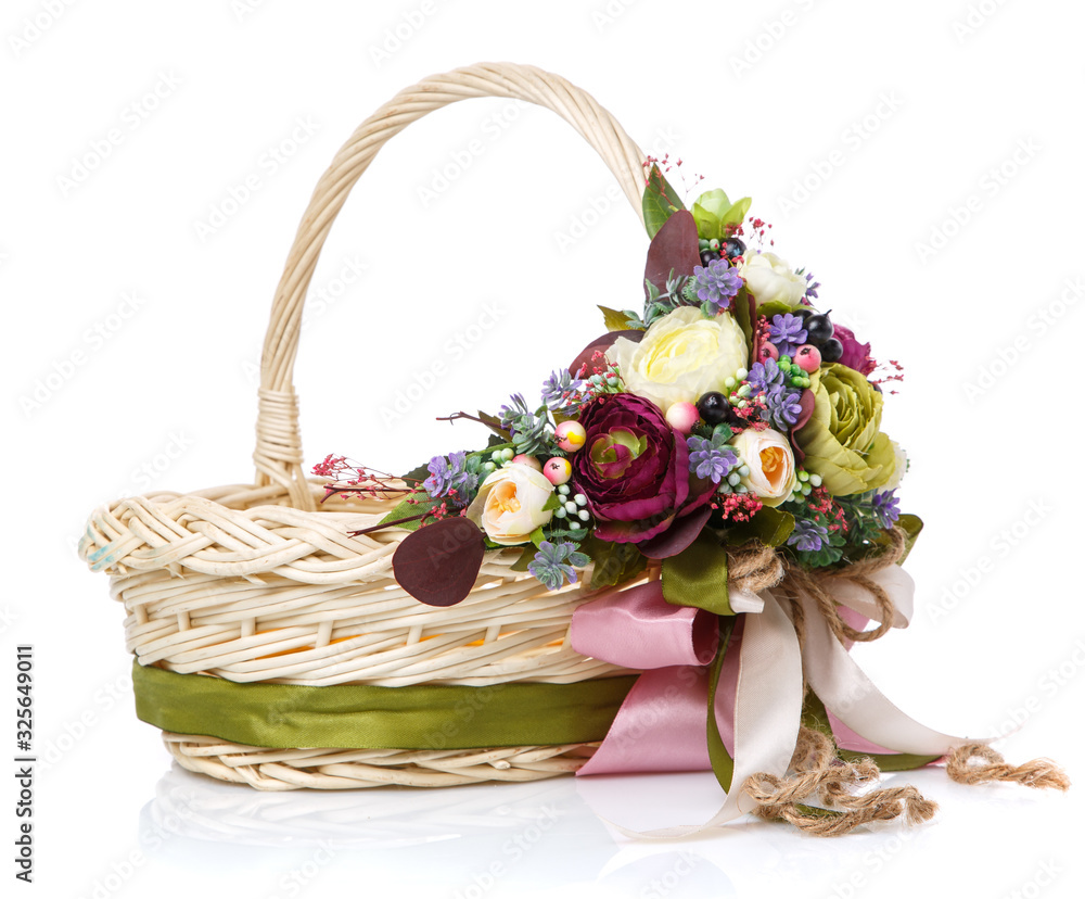 Decorative wicker basket with original floral decor and long colored ribbons.
