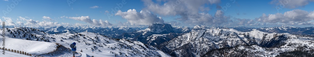 panorama photography, beautiful panoramic view over the Austrian Alps to the Wilder Kaiser mountain, blue sky with some clouds