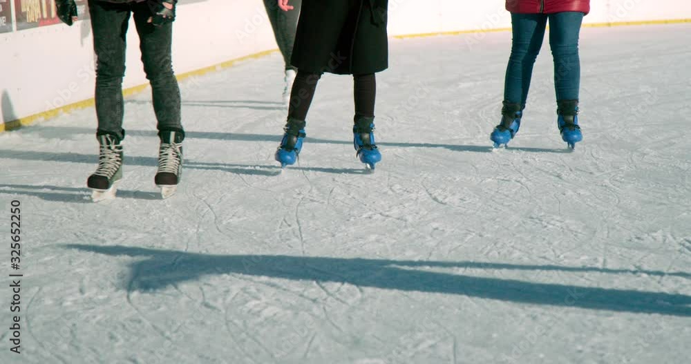 People enjoying an ice skating adventure in the Warmian-Masurian province in Poland - slowmo People enjoying an ice skating adventure in the Warmian-Masurian province in Poland - slowmo