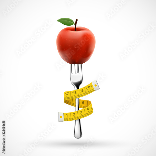Fork with apple fruit and a measuring tape around