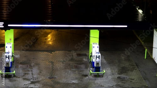 gas station at night, self-service. Time Lapse. Aerial view